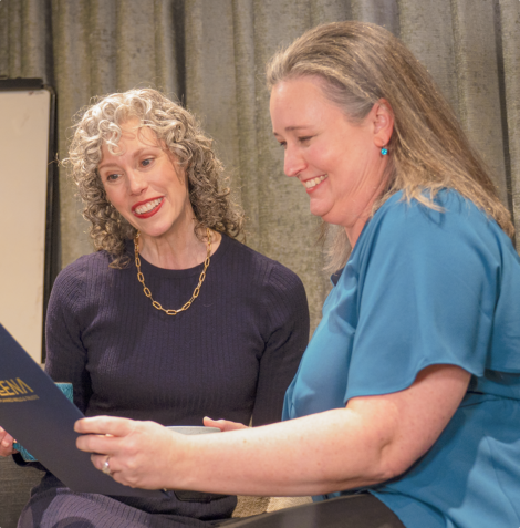 Rachel Murphy, estate planning attorney and founder of Willena, reviewing a document with a client
