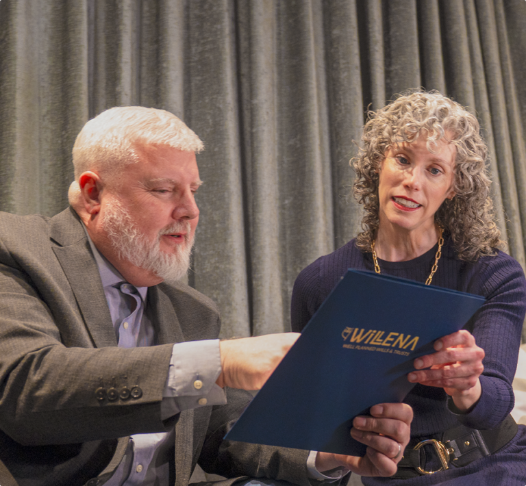 Rachel Murphy, estate planning attorney and founder of Willena, reviewing a document with a client